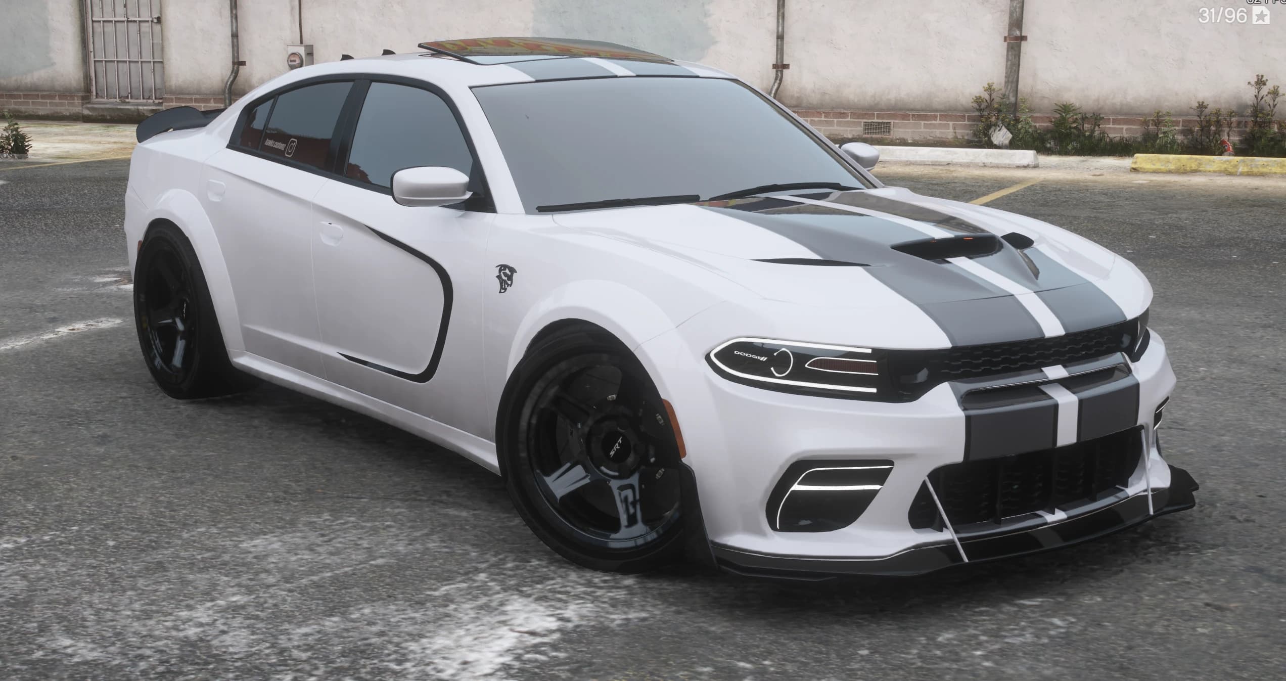 Front three quarter view of the white widebody Charger with twin grey bonnet stripes, hood scoops, a splitter with canards and black five spoke wheels with SRT caps