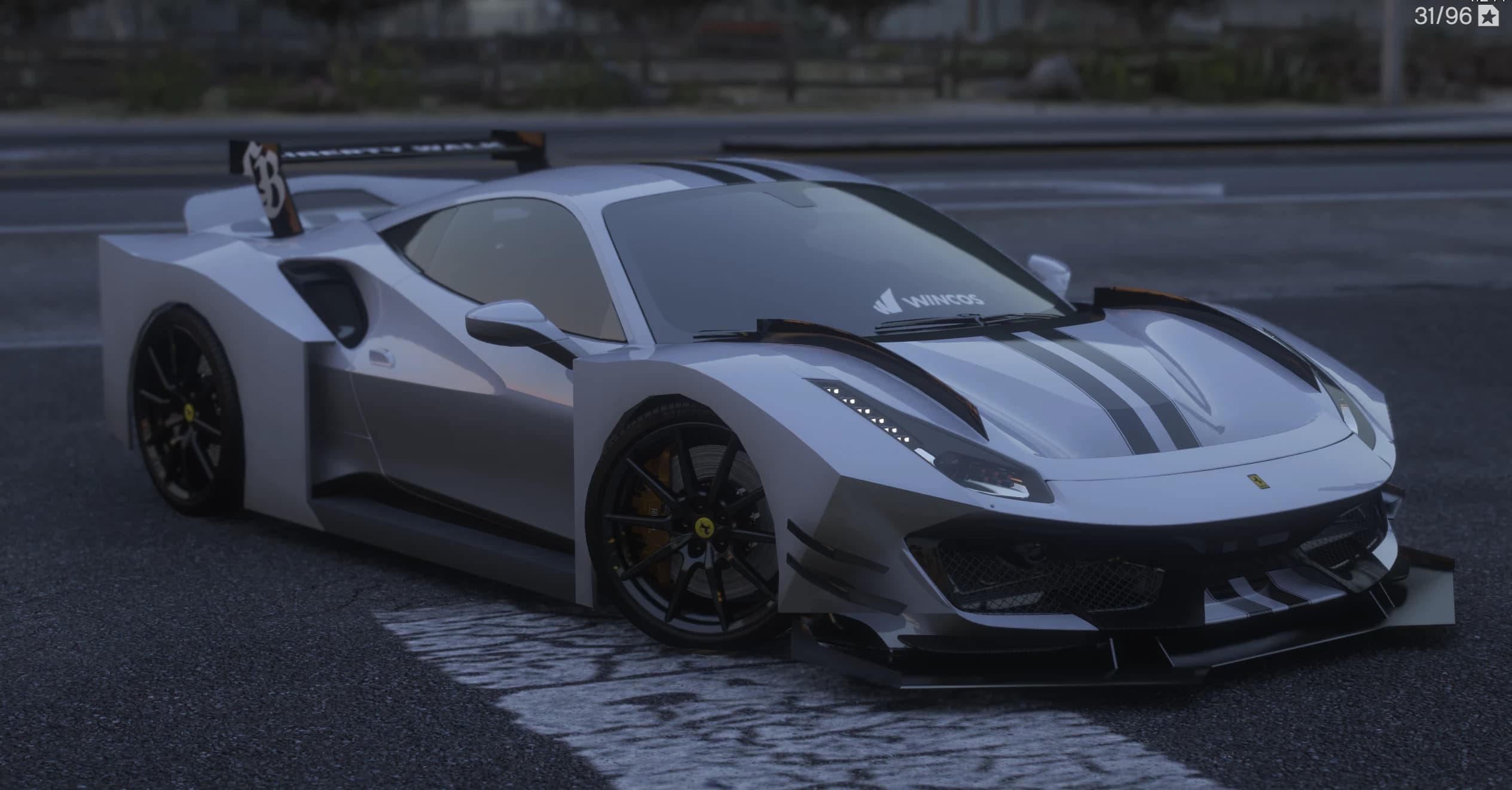 Front three quarter view of the white Ferrari 488 Pista with the Liberty Walk box fenders, twin black stripes, layered front splitter and a tall LB wing at dusk