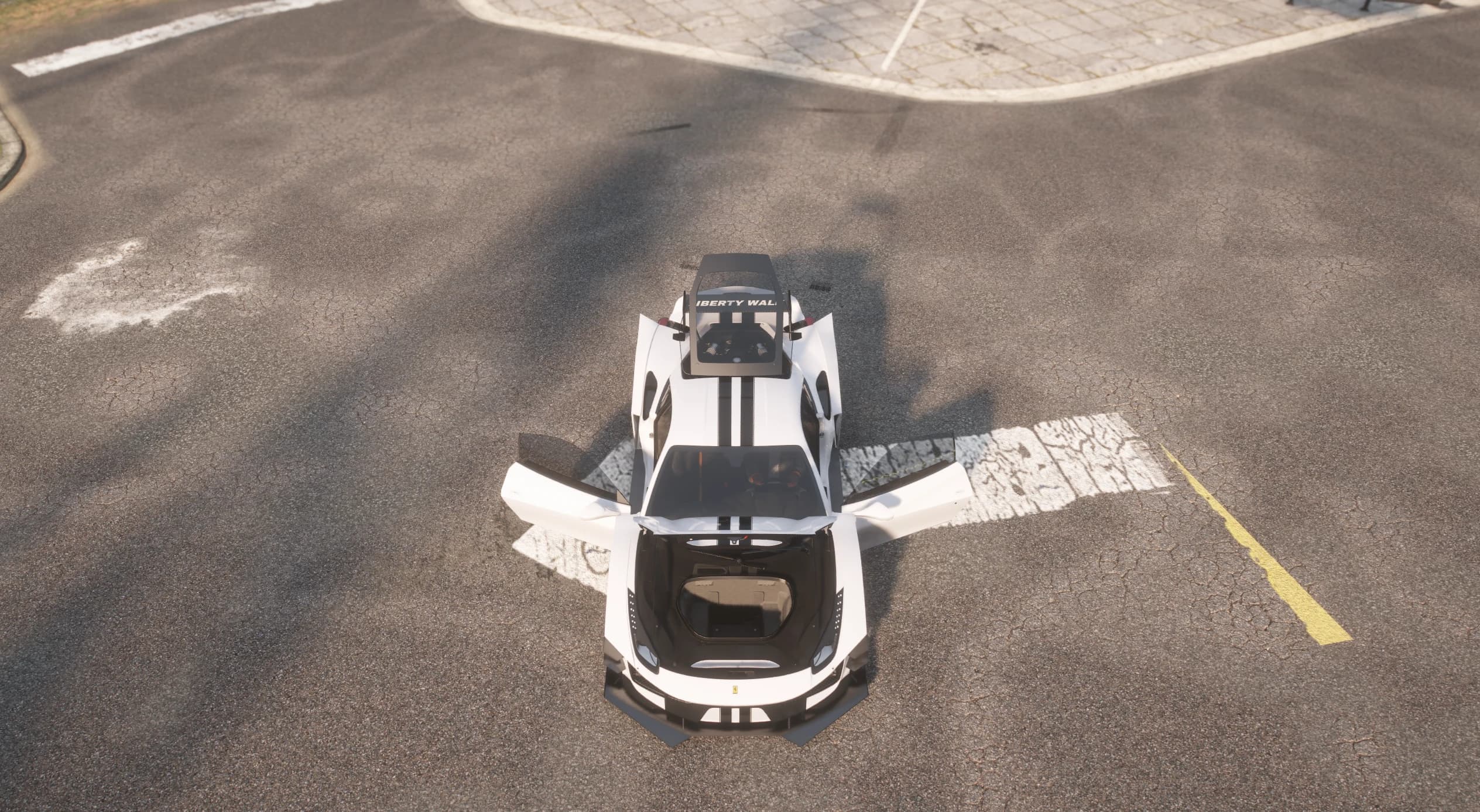 Top down view over a crosswalk with both doors and the front luggage compartment open and the Liberty Walk banner on the windscreen