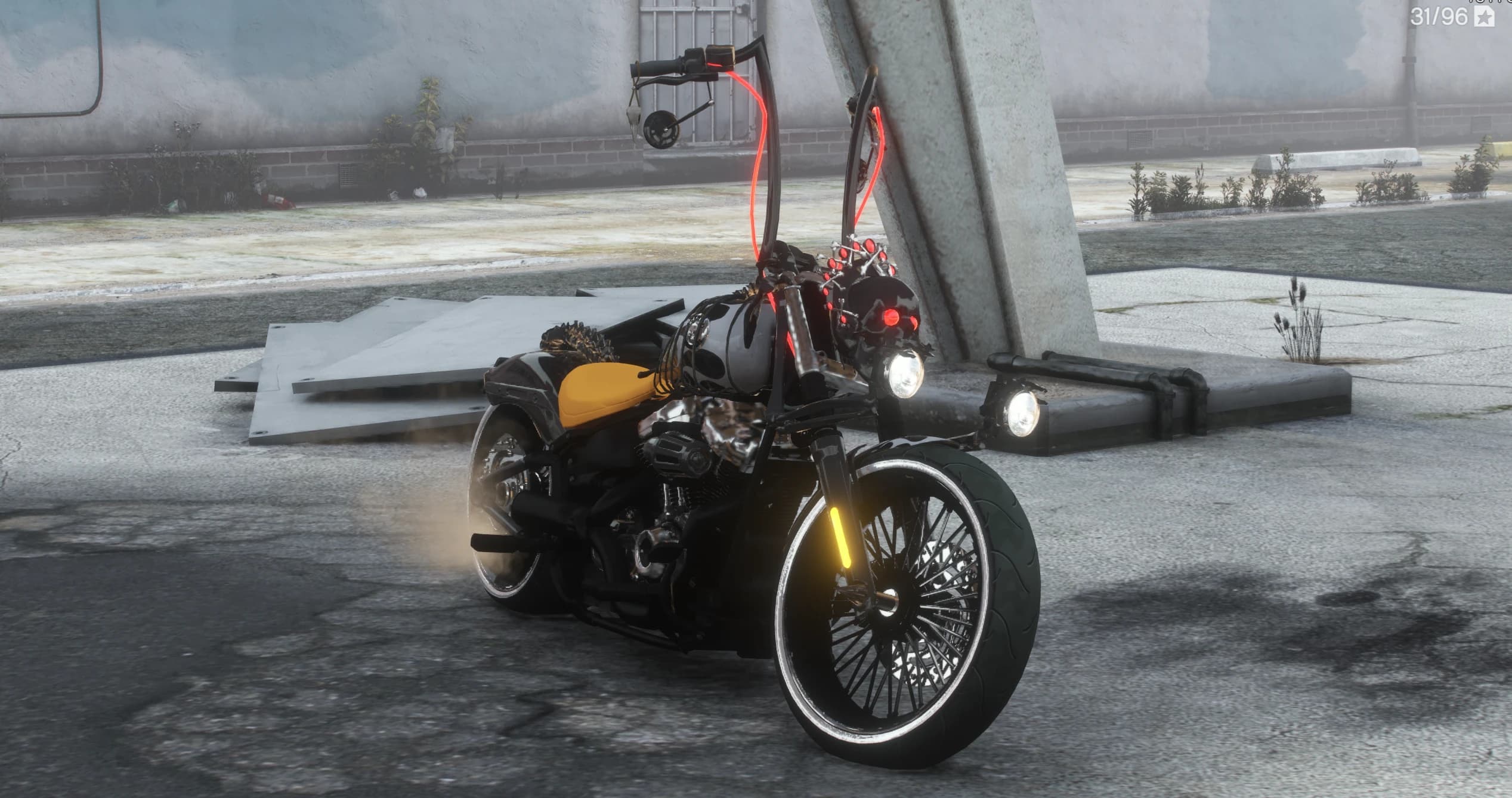 Front three quarter view in the morning fog with the skull's red eyes lit between twin round lamps and the red neon lines running up the handlebars