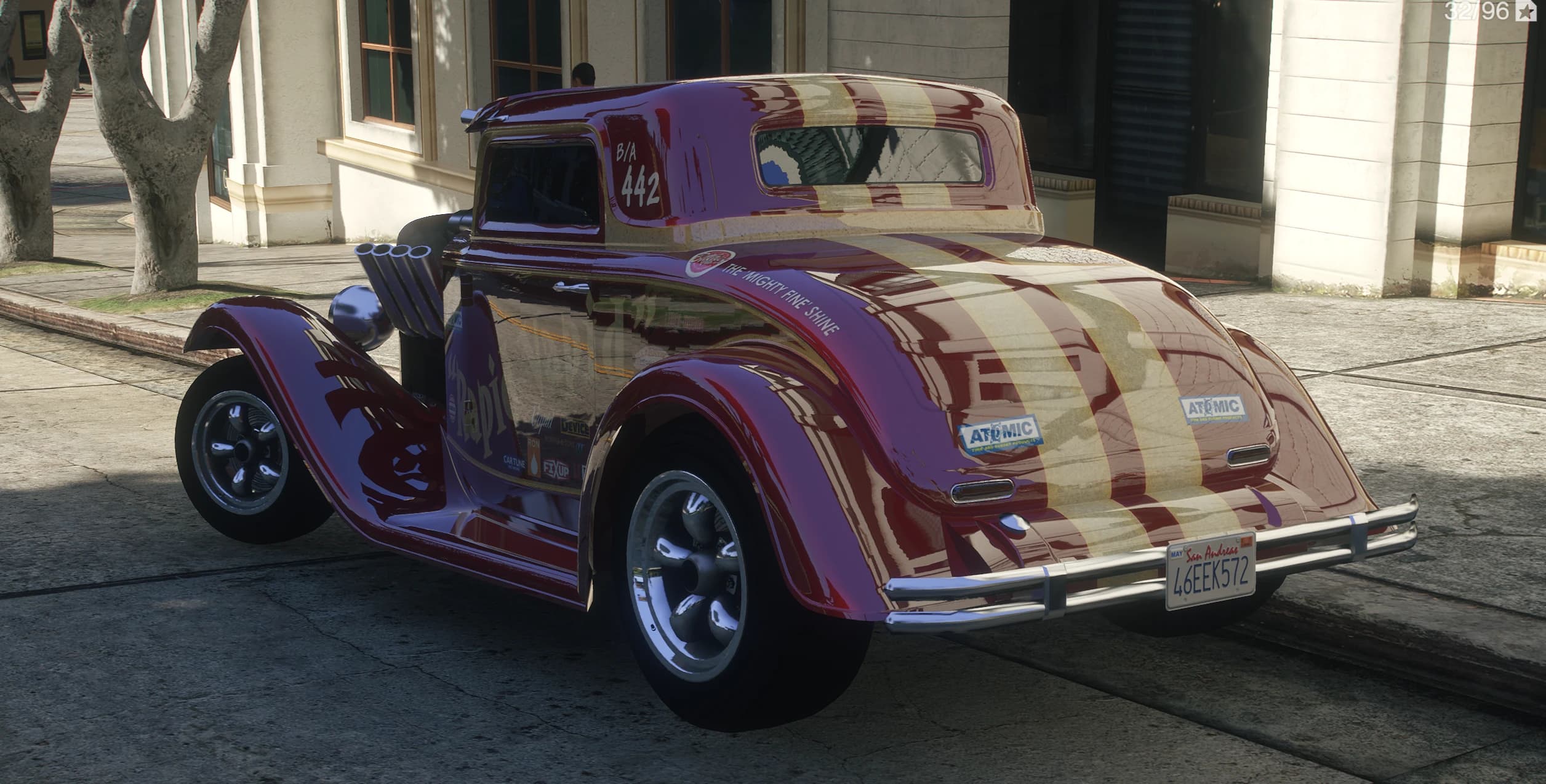 Rear view of the XHustler with cream stripes, sponsor stickers and a San Andreas license plate