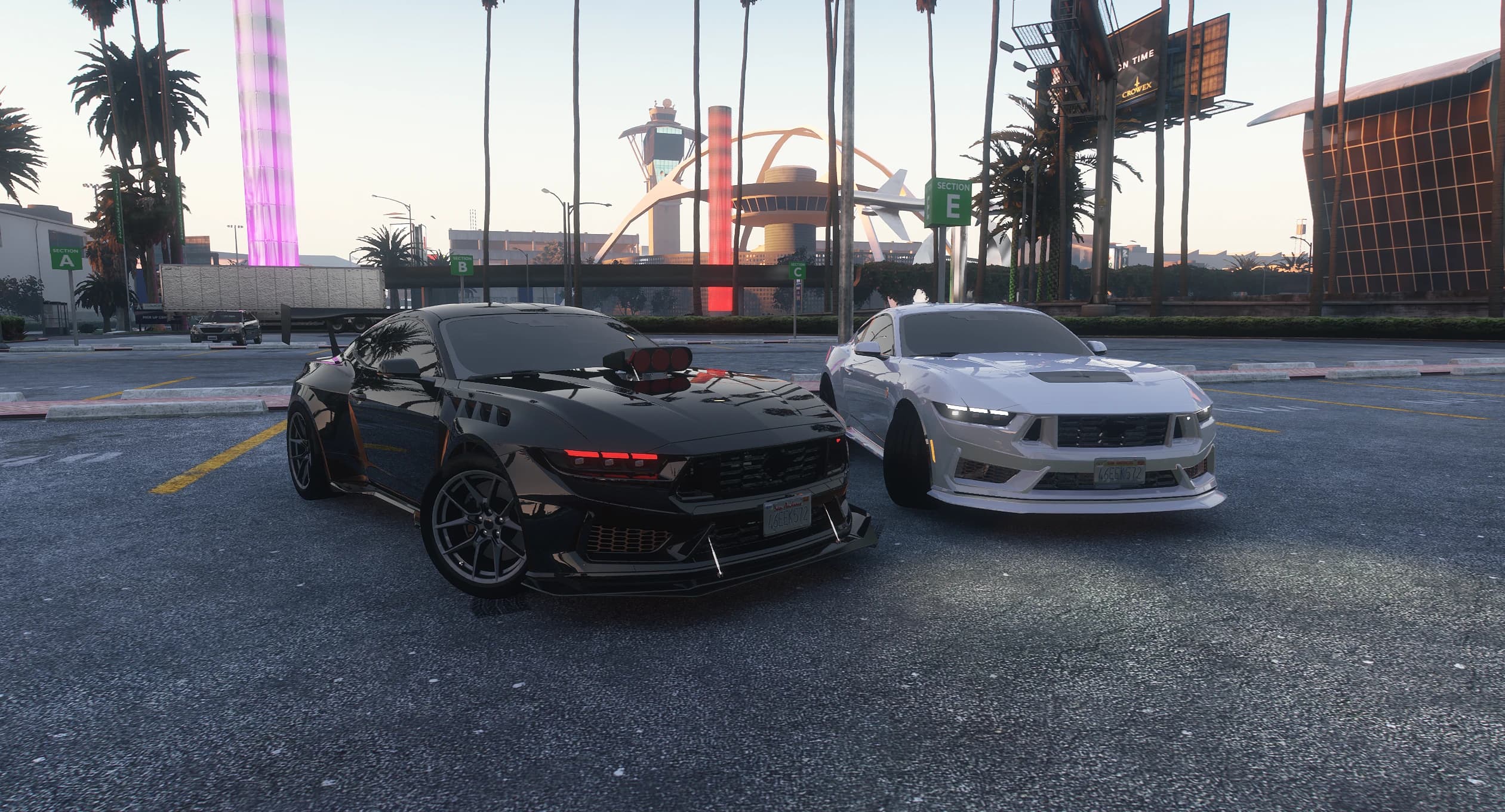 Black stanced and white stock 2025 Mustangs parked side by side at the Los Santos airport