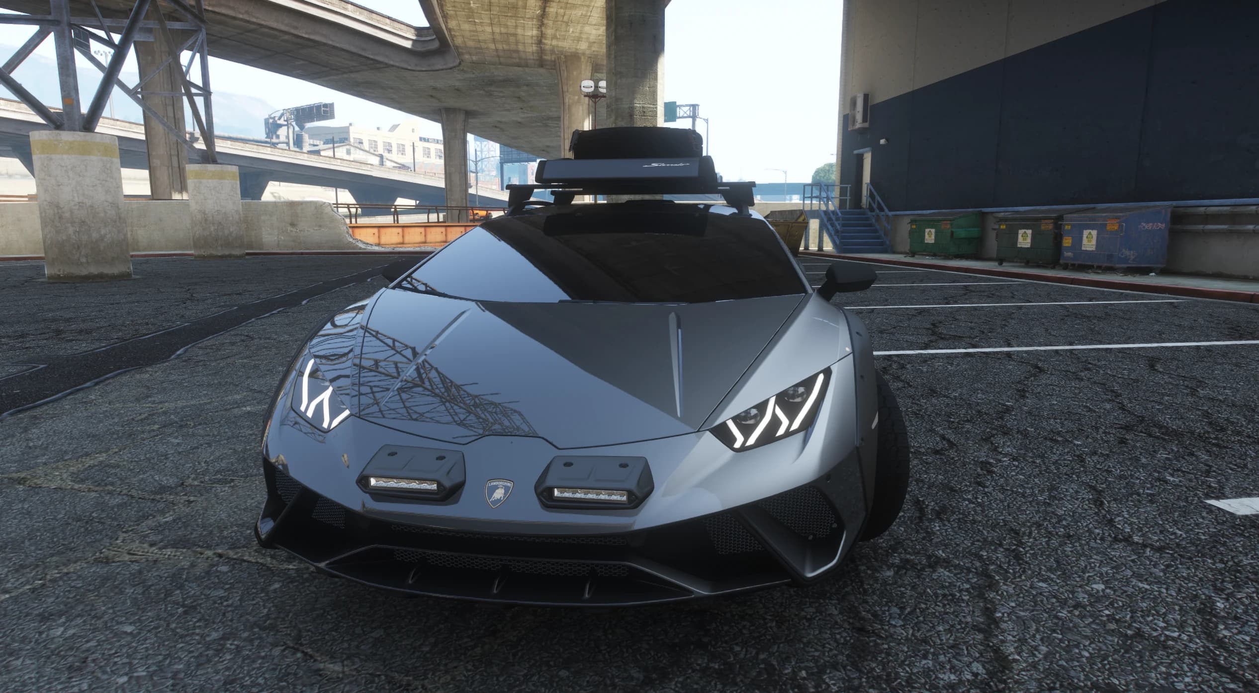 Head on front view under a freeway with the twin LED pod lights on the nose, Y shaped daytime lights and the roof scoop