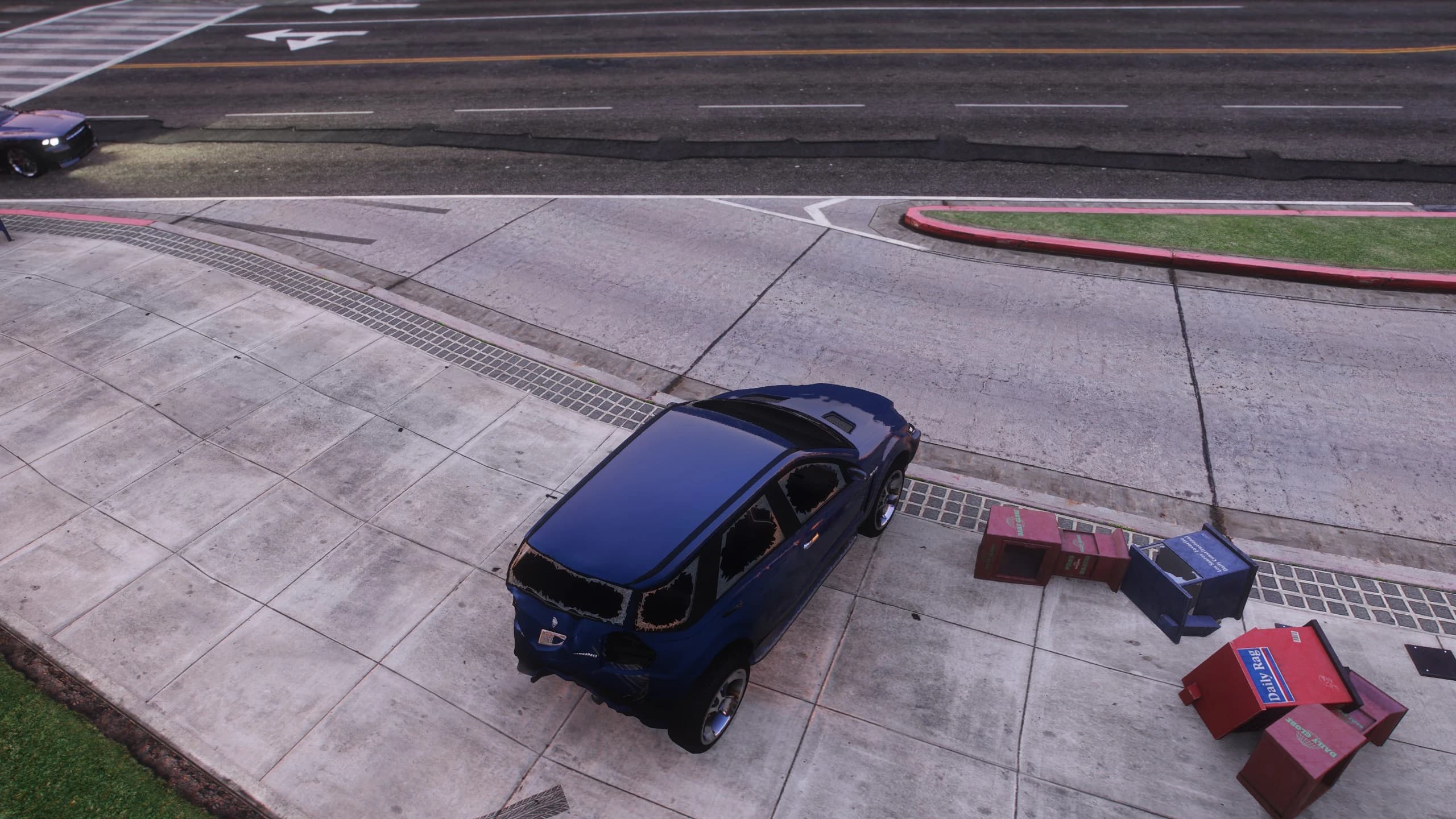 Blue SUV up on the pavement with its rear windows blown out and the rear bumper hanging off, newspaper boxes scattered by the impact
