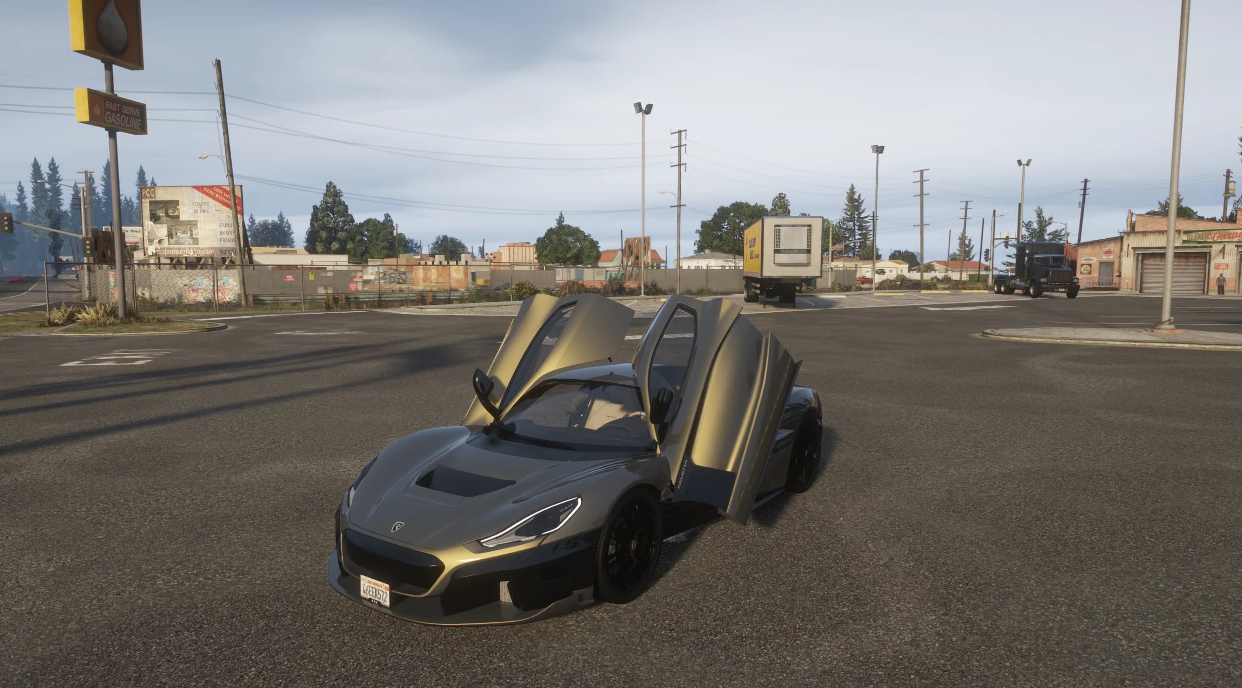 The Rimac Nevera with both butterfly doors raised at a gas station, showing the beige interior