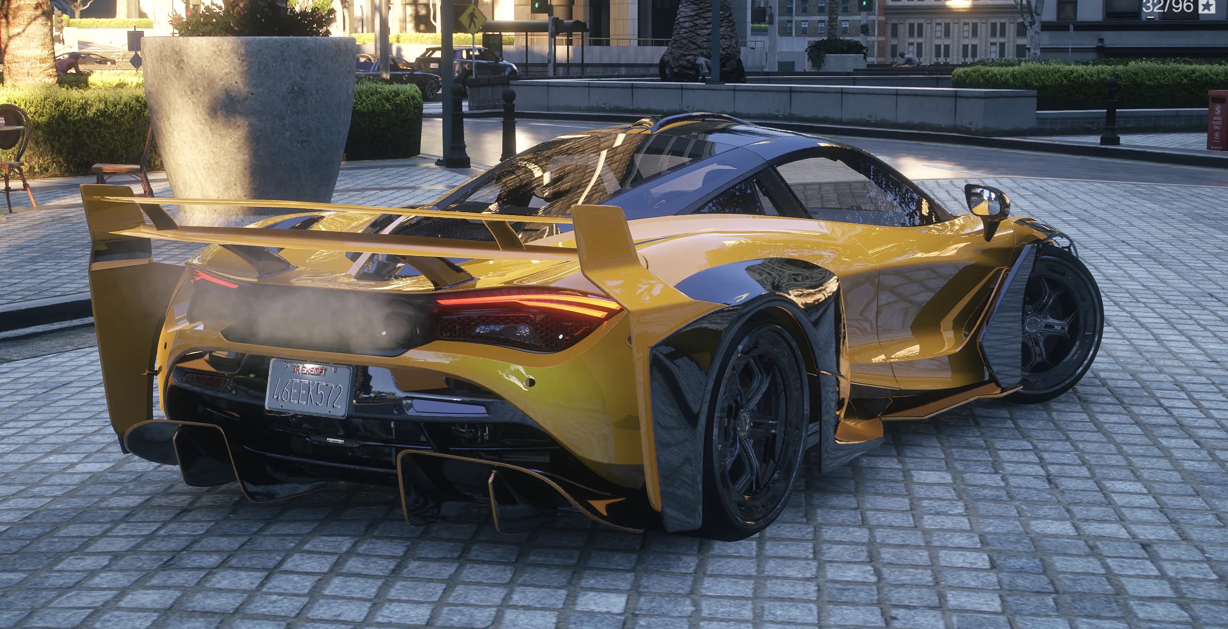 Rear view of the McLaren 720s Zacoe Widebody showing the GT wing, the diffuser and smoke from the exhaust