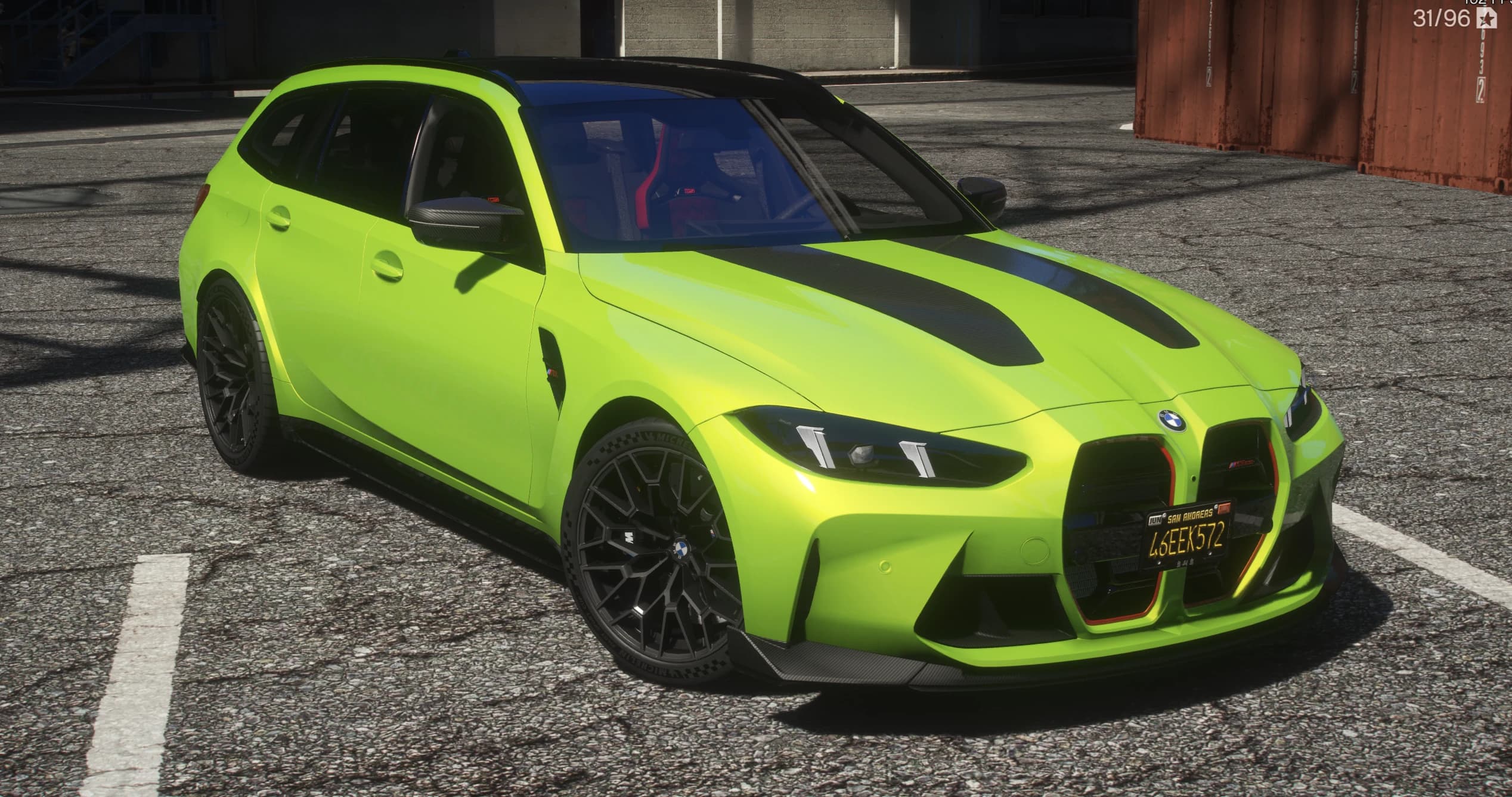 Front three quarter view of the acid green M3 CS Touring with exposed carbon hood sections, red edged kidney grilles and a carbon roof
