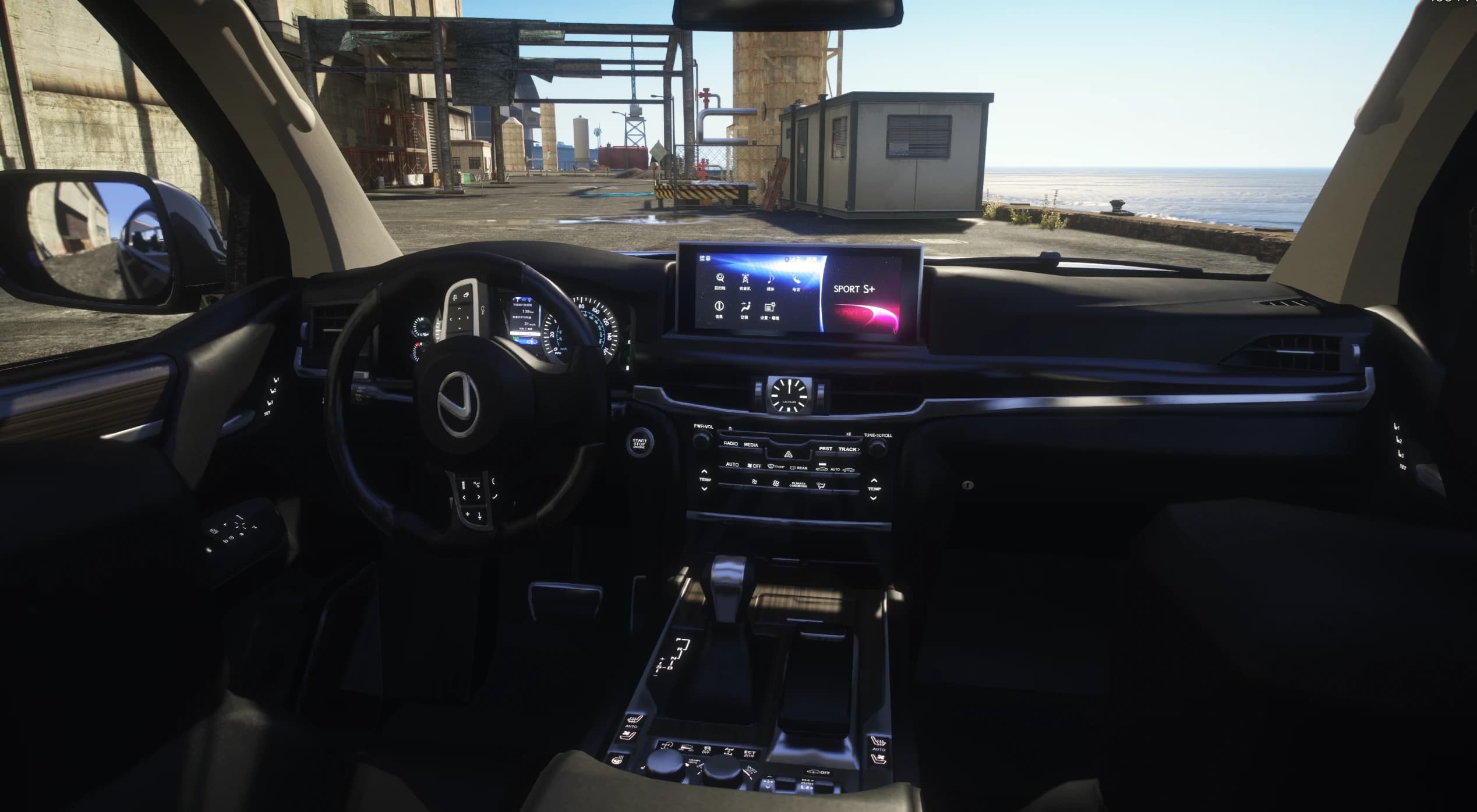 Interior of the LX 570 with the Lexus steering wheel, widescreen infotainment, analog clock and full center console