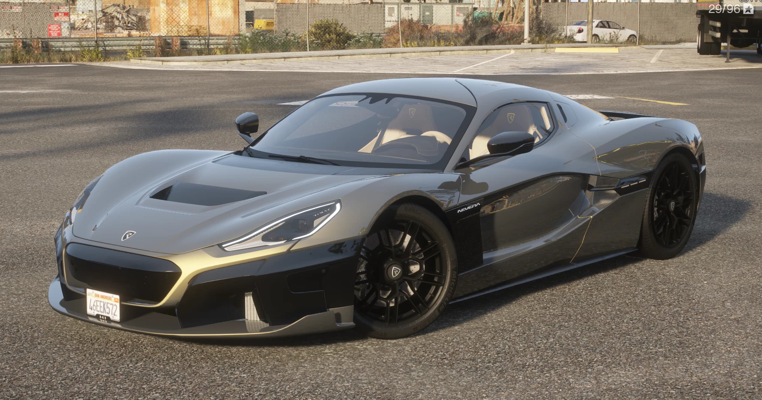 Grey Rimac Nevera electric hypercar with a RIMAC grille badge and black wheels, front three-quarter view in a parking lot