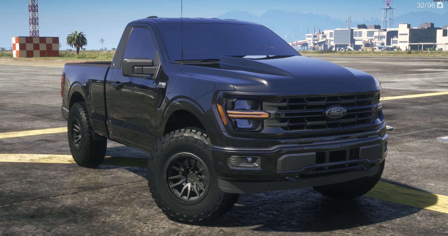 Front three quarter view of the black single cab 2025 F-150 at an airfield with the cowl hood, blacked out grille, XLT fender badge and all terrain tyres