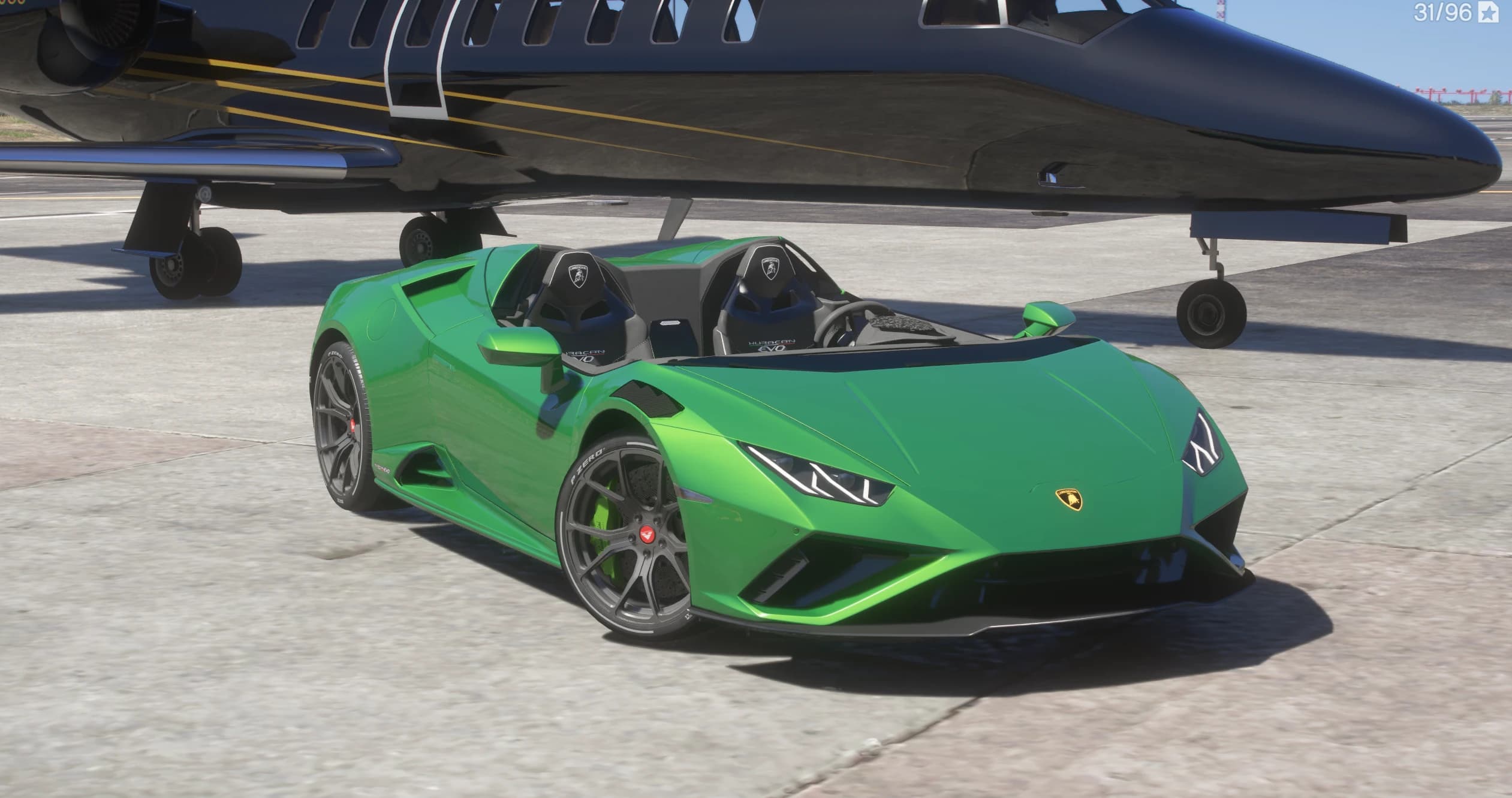 Front three quarter view of the green windscreenless Huracan speedster with twin seat fairings, parked beside a black private jet
