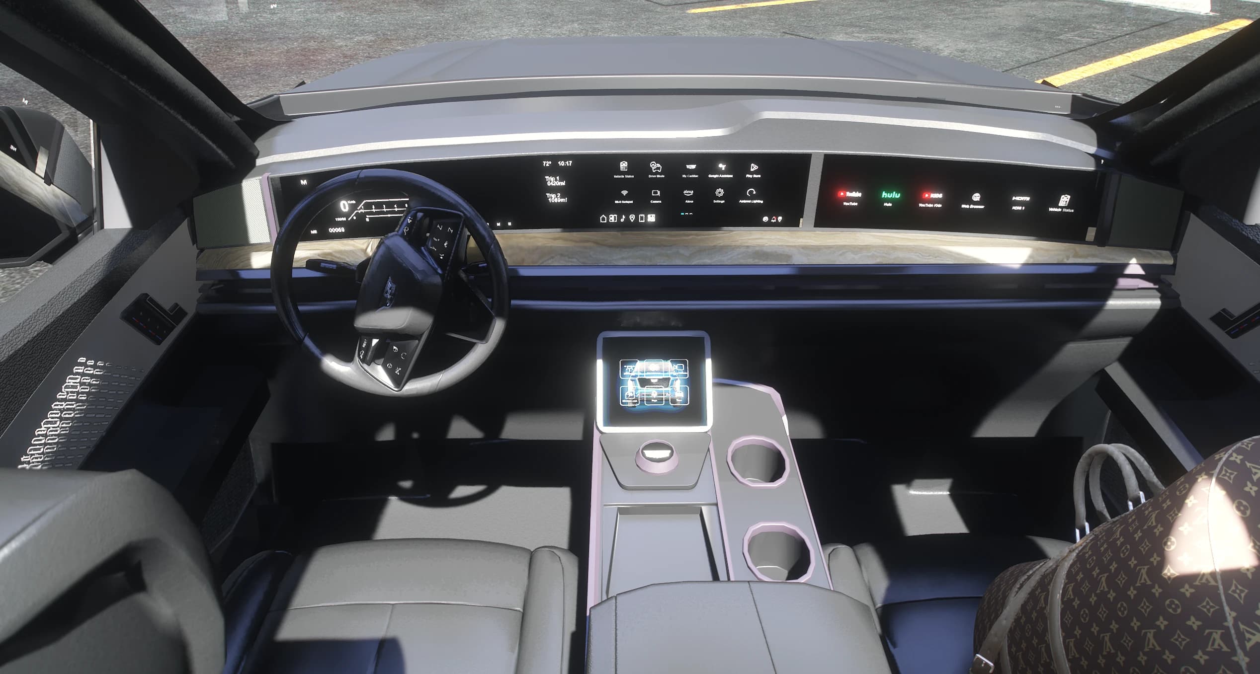 Dashboard of the Escalade with the panoramic triple screen and illuminated center console