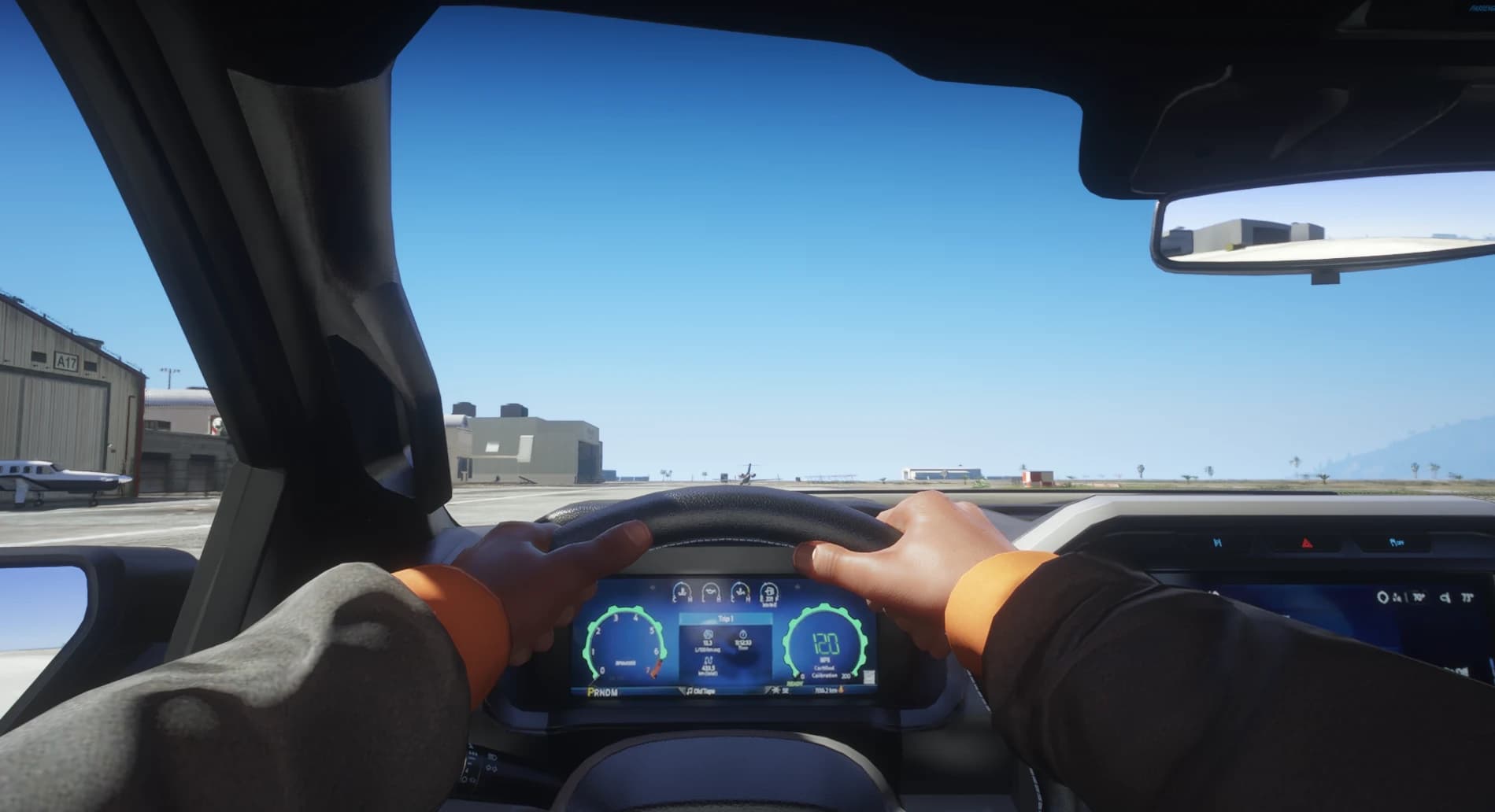 First person driving view with hands on the wheel, the full digital instrument cluster and the airfield through the windshield