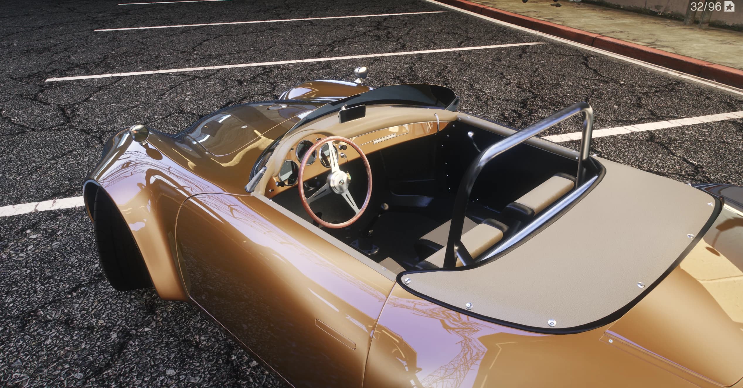 Top view of the open cockpit with the wood rimmed steering wheel, body color dash and the snapped tonneau cover