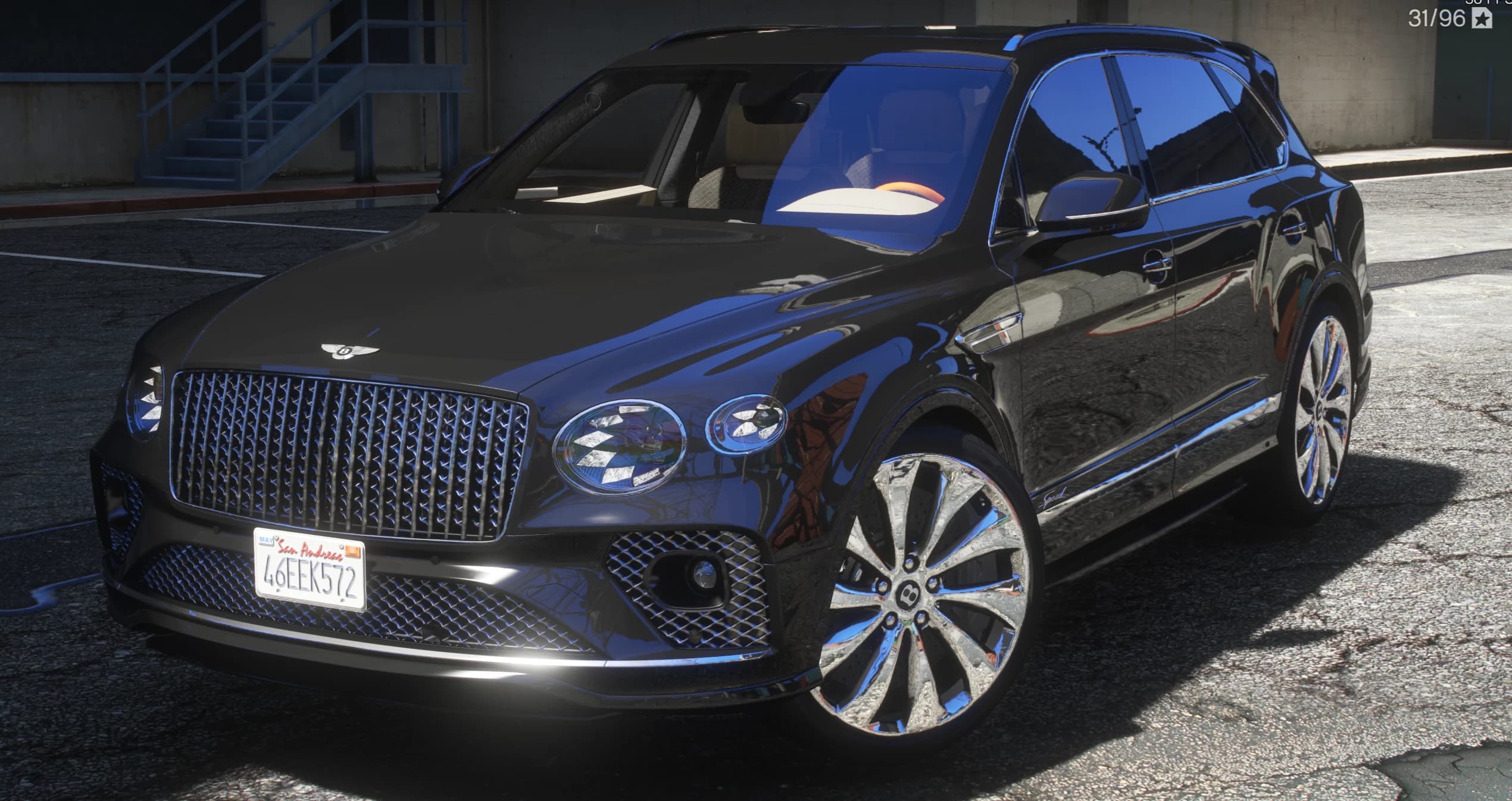 Front three quarter view of the black Bentayga with its chrome matrix grille, winged B emblem, oval headlights and polished multi spoke wheels