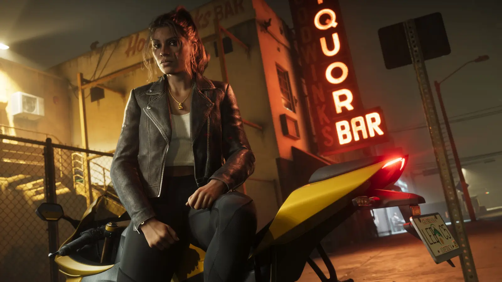 Lucia sitting on a yellow sport motorbike at night outside Hodwinks Bar, with a tall red neon sign reading LIQUOR BAR glowing above the entrance and fog under the street lights
