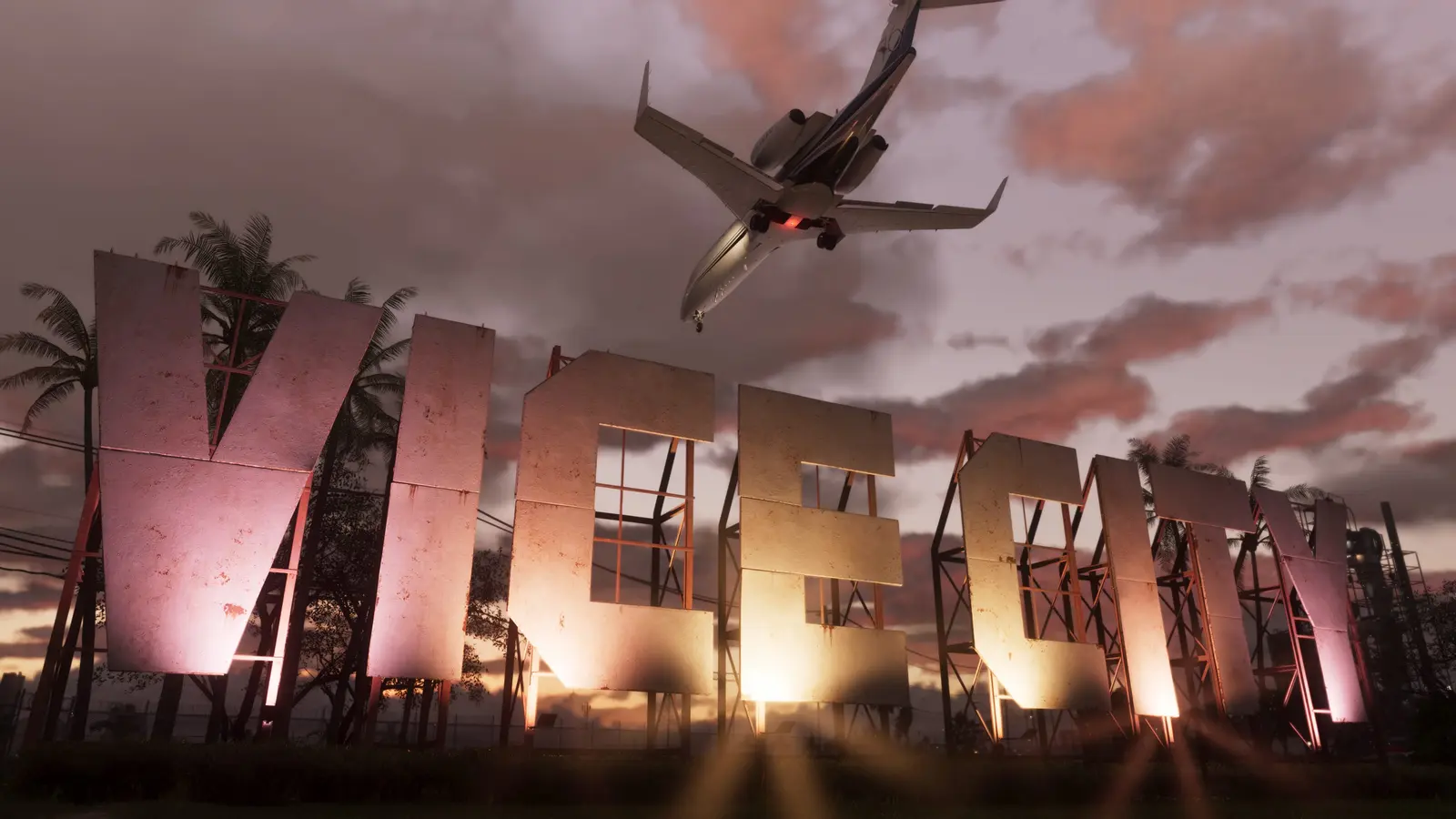 A private jet flies over a giant VICE CITY sign at sunset in GTA 6