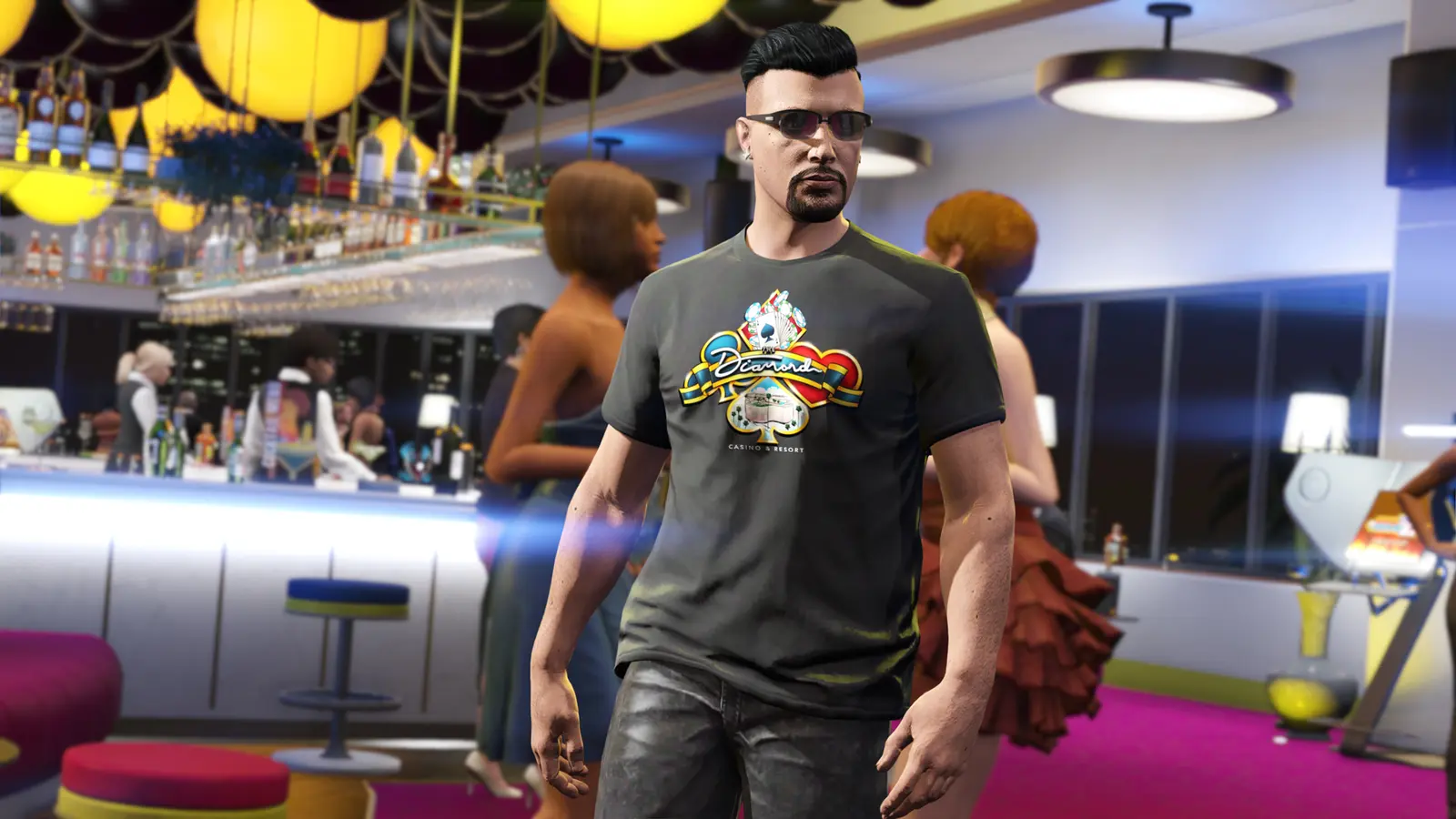 Player in a Diamond Casino and Resort t-shirt standing at the casino bar in GTA Online, with drinkers and bottle shelves behind him